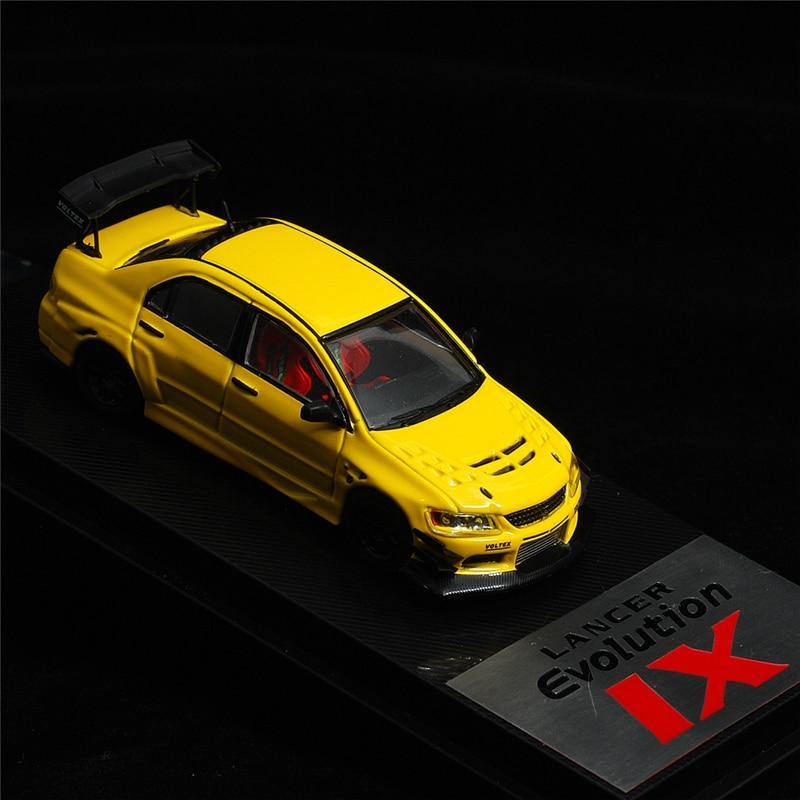 1:64 Voltex Mitsubishi Lancer Evolution IX yellow model car - JDM Global Warehouse