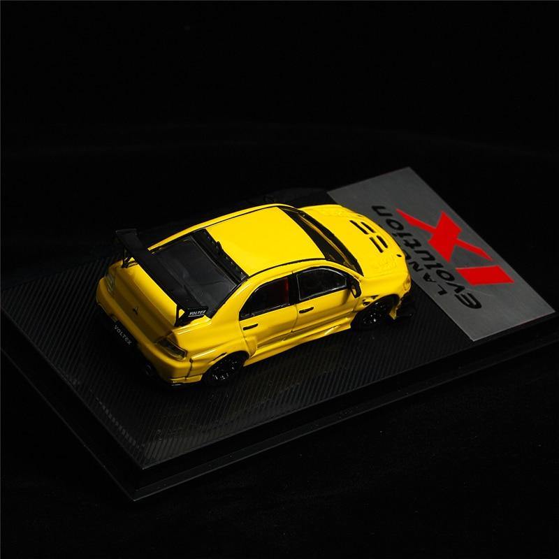 1:64 Voltex Mitsubishi Lancer Evolution IX yellow model car - JDM Global Warehouse